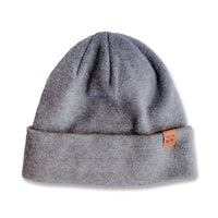 Gray beanie hat with a fold-over cuff and a small leather patch, designed to block RF radiation for safety.