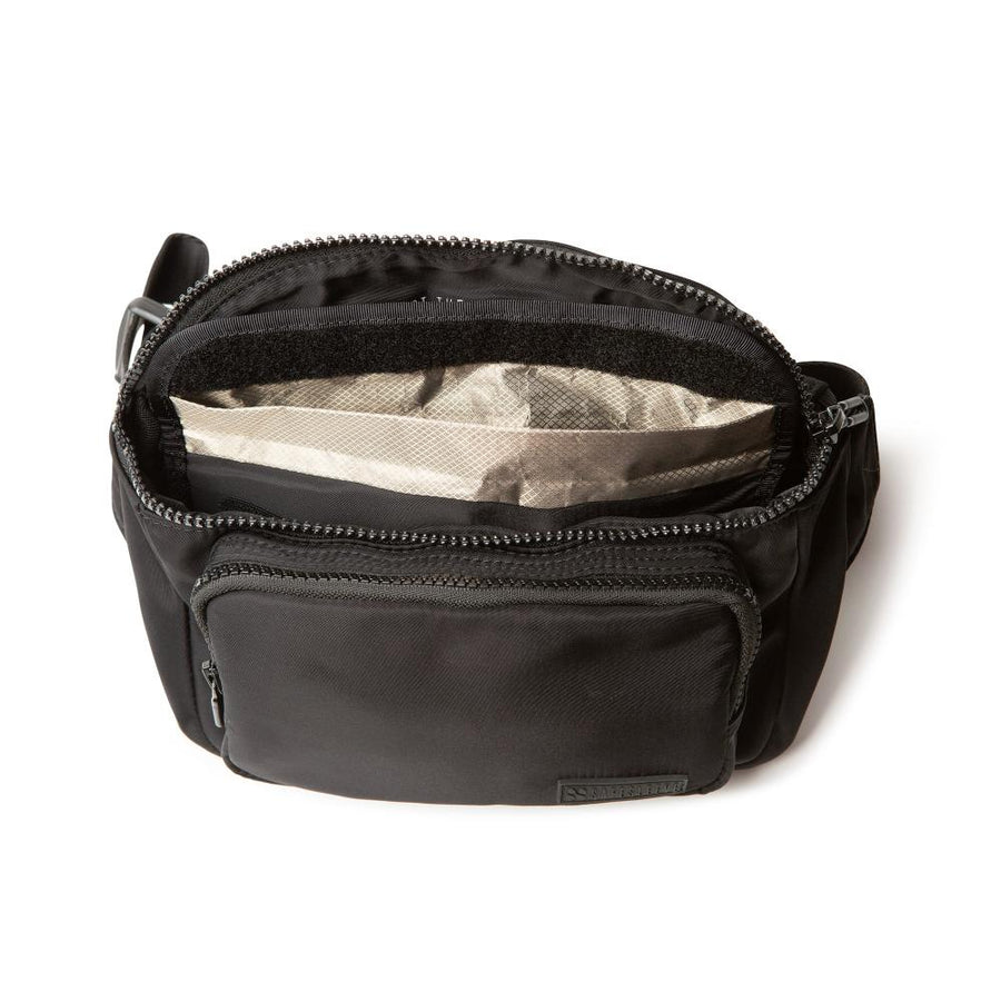 Open black security and privacy strap pack with multiple compartments and interior mesh pocket, designed for secure carrying.
