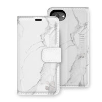 White marble-patterned detachable case for iPhone 16 series, featuring a secure closure and camera cutout.