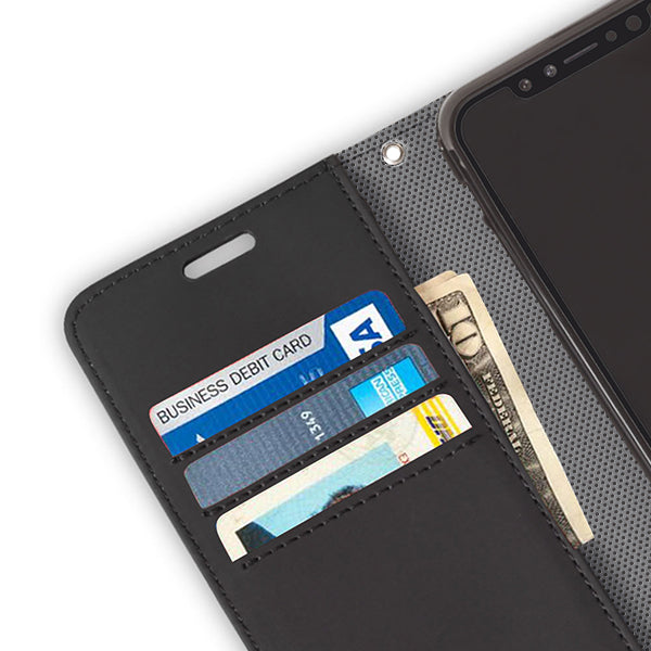 Close-up of a black SafeSleeve wallet case for iPhone 14 series with card slots holding credit cards and cash.